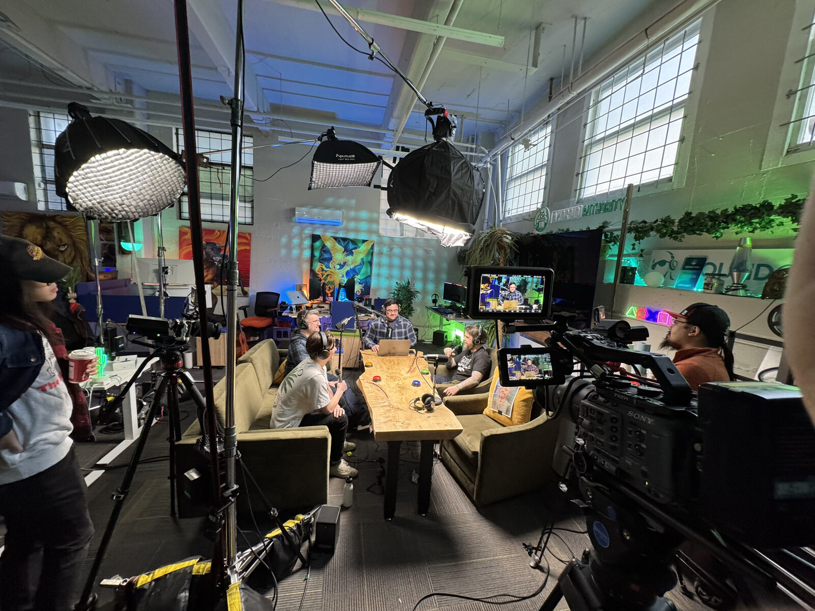 Full lighting and camera setup on the Authority Media studio floor